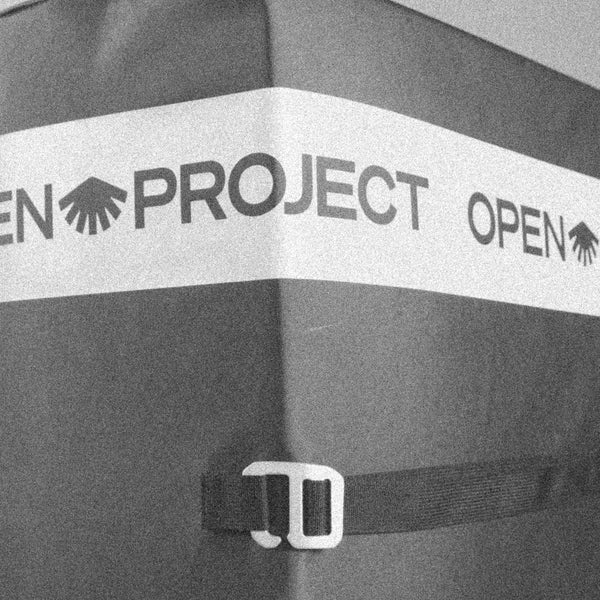 Black and white image of a climbing pad with 'Open Project' branding.