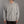 Person wearing a gray sweatshirt with text on a plain background
