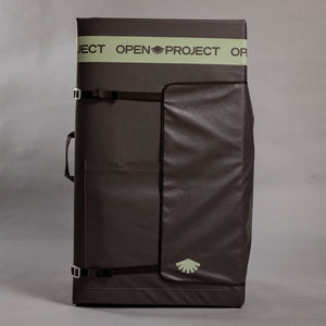 Black crash pad with 'Open Project' branding on a gray background