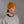 Man wearing a mustard yellow beanie and gray sweatshirt with 'Open Project' logo on a gray background