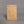 Brown bag of climbing chalk labelled 'dry fine'