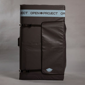 Black crash pad with 'Open Project' branding on a gray background