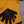 Close up of yellow boulder bag with black logo on front. 
