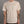 Person wearing a beige t-shirt with a logo on a gray background