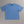 Blue t-shirt with 'Open Project' text on a gray background